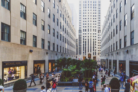 NEW YORK, NEW YORK - September 4th, 2017: detail of the street surrounding the Rockefeller Center in Manhattan, nyc with plenty of turists (unidentified)のeditorial素材