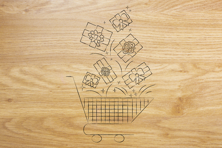 Christmas wishes and presents concept: shopping cart with presents flying into itの写真素材