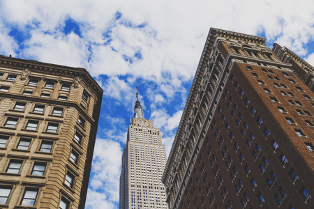 NEW YORK, USA - September 8th, 2017: Herald Square architecture and the Empire State Building in the backgroundのeditorial素材