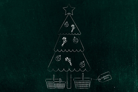 Christmas tree with shopping carts below them, concept of retail and promotions for the festive seasonの写真素材