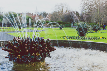 DUBLIN, IRELAND - January 6th, 2018: fountain in Saint Stephen's Green park in Dublin city centre on a calm, overcast and cold winter dayのeditorial素材