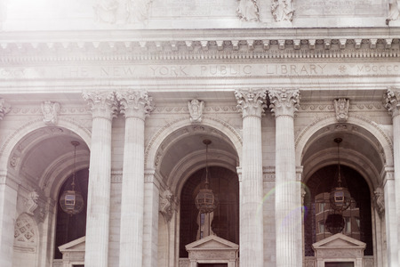 NEW YORK, NY - June 8th, 2014: detail of the New York Public Library building with sun flareのeditorial素材
