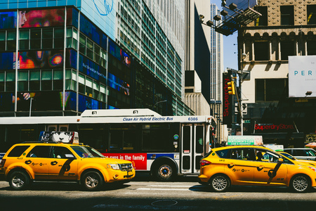 NEW YORK, NY - June 8th, 2014: detail of busy Manhattan streets with yellow cabs and traffic on a sunny summer dayのeditorial素材