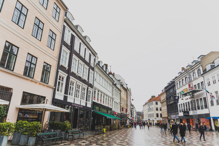 COPENHAGEN, DENMARK - March 11th, 2018: Architecture and buildings in the famous shopping street of Stroget in Copenhagen featuring the typical Scandinavian styleのeditorial素材