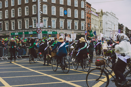 DUBLIN, IRELAND - 17th March, 2018: performers and crowd participating in the 2018 Saint Patrick's parade in Dublin on O'Connell Bridge in the city centreのeditorial素材