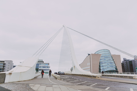 DUBLIN, IRELAND - 17th March, 2018: Samuel Beckett harp bridge and Convention Centre on the river Liffey in Dublin city centreのeditorial素材