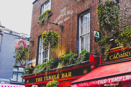 DUBLIN, IRELAND - April 12th, 2018: the Temple Bar pub in Dublin, arguably the most popular traditional Irish pub in Irelandのeditorial素材