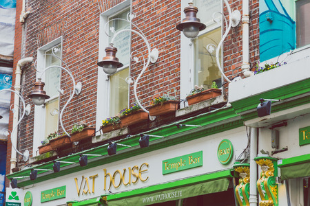 DUBLIN, IRELAND - April 12th, 2018: pubs in the Temple Bar neighbourhood of Dublin city centre, the area is famous for its popular traditional pubs and nightlifeのeditorial素材