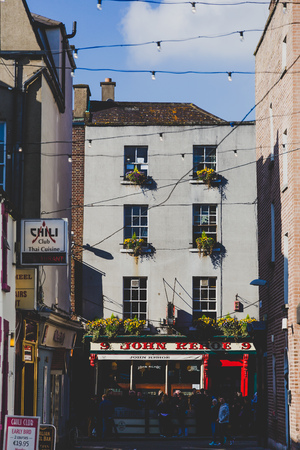 DUBLIN, IRELAND - April 14th, 2018: traditional Irish pubs along the streets of Dublin city centreのeditorial素材