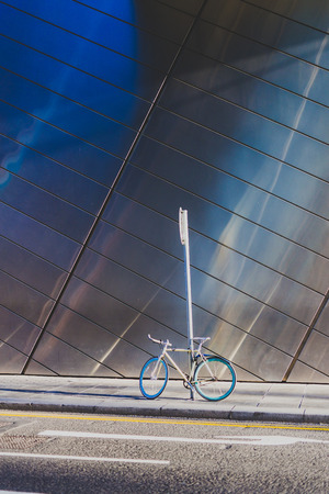 DUBLIN, IRELAND - May 6th, 2018: bike parked outside the metal structure of the Bord Gais THeatre exteriorのeditorial素材