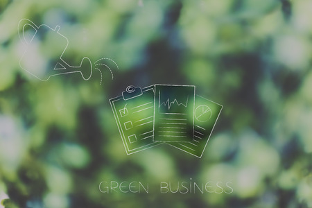 growing towards a greener economy conceptual illustration: watering can and business documents going greenの写真素材