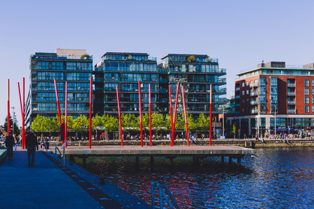 DUBLIN, IRELAND - May 16th, 2018: Grand Canal Square in the renewed area of the Docklands with modern buildings on a sunny dayのeditorial素材