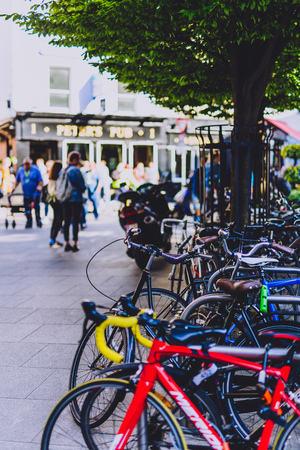 DUBLIN, IRELAND - May 23rd, 2018: line of bikes parked in front of Irish pubs in Dublin city centreのeditorial素材