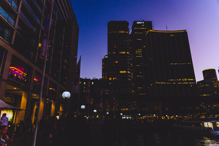 SYDNEY, AUSTRALIA - December 30th, 2014: detail of Circular Quay buildings and Sydney Harbur view by nightのeditorial素材