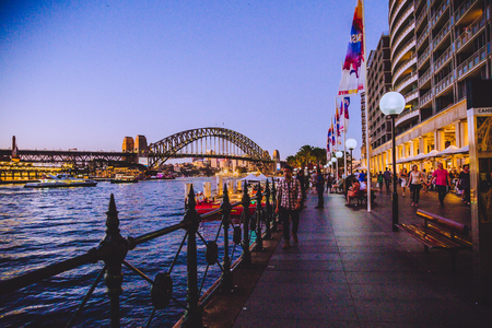 SYDNEY, AUSTRALIA - December 30th, 2014: the Sydney Harbour Bridge at dusk and view of the surrounding areaのeditorial素材