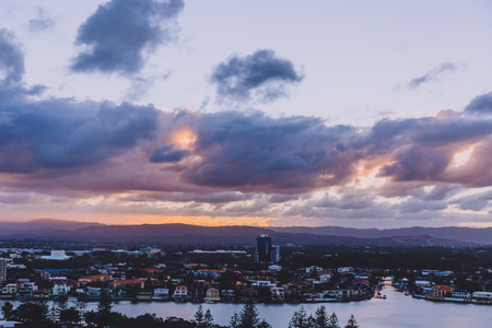 GOLD COAST, AUSTRALIA - January 6th, 2015: view of Surfers Paradise skyscrapers and water inlets at sunsetのeditorial素材
