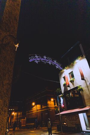 DUBLIN, IRELAND - December 19th, 2018: Irish pub with Christmas decorations in Dublin city centre