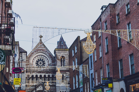 DUBLIN, IRELAND - January 5th, 2019: streets of Dublin city centre with Christmas lights and festive...