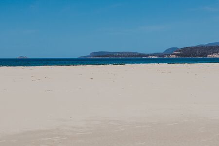 sunny pristine and deserted beach overlooking the South Pacific Ocean in Marion Bay along the East...