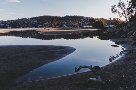 HOBART, AUSTRALIA - September 19th, 2019: Tasmanian beach landscape view in Hobart shot at dusk with soft lightのeditorial素材