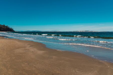 Tasmanian beach landscape view in Hobart shot at dusk with soft lightの写真素材