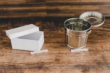 tidying up and decluttering your space concept, box and garbage bin with Things to Keep and Things...