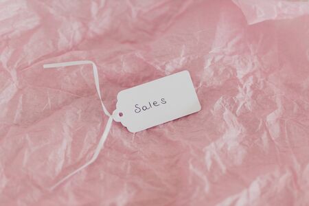 shopping and promotions conceptual still-life, Sales price tag on pink backgroundの写真素材