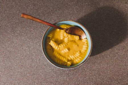delicious healthy plant-based recipes concept, fusilli pasta bowl with pumpkin sauceの写真素材