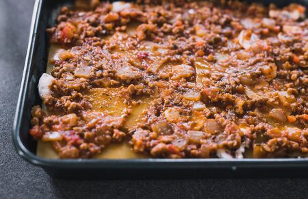 vegan lasagne with dairy free cheese and vegan bolognaise mince, healthy plant-based diet conceptの写真素材
