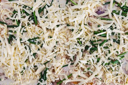 healthy plant-based recipes, eggplant parmigiana with vegan cheese before going in the ovenの写真素材