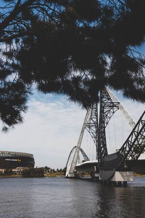 PERTH, WESTERN AUSTRALIA - December 26th, 2019: the Matagarup Bridge over the Swan River in Perth city CBD and the Optus Stadium in the distanceのeditorial素材