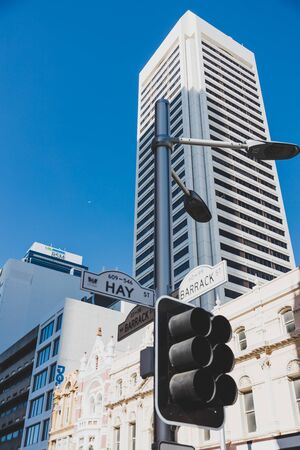 PERTH, WESTERN AUSTRALIA - December 24th, 2019: Perth city CBD urban shot with street light and road signs featuring Hay St and Barrack St and surrounding buildingsのeditorial素材