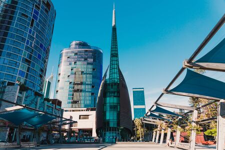 PERTH, AUSTRALIA - December 28th, 2019: the Bell Tower, one of the main landmark of the City of Perth in the CBD shot at dusk with serene clear blue skyのeditorial素材