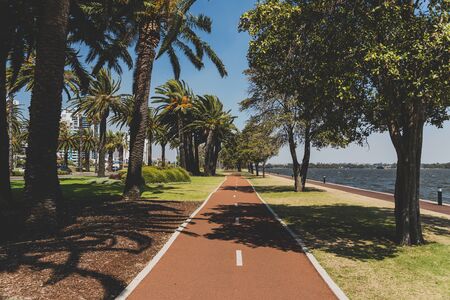 PERTH, WESTERN AUSTRALIA - January 9th, 2020: detail of the Riverside walk along the Swan River from Perth CBD on a sunny and warm summer dayのeditorial素材