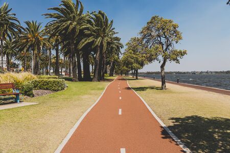 PERTH, WESTERN AUSTRALIA - January 9th, 2020: detail of the Riverside walk along the Swan River from Perth CBD on a sunny and warm summer dayのeditorial素材