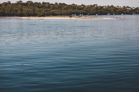 PERTH, WESTERN AUSTRALIA - January 6th, 2020: view of the Swan River and surrounding coastline from the water on a sunny summer dayのeditorial素材