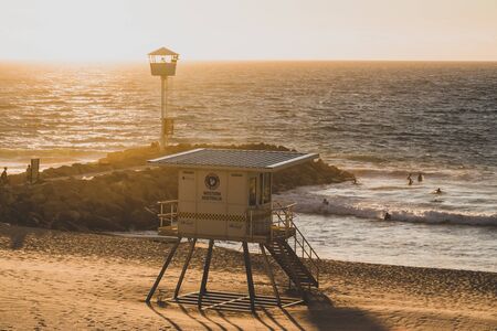 PERTH, WESTERN AUSTRALIA - January 8th, 2020: view of the sunset over the Indian Ocean at City Beach, one of the most popular beaches near Perth on a warm summer dayのeditorial素材