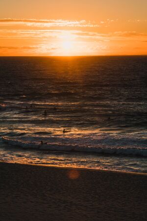 PERTH, WESTERN AUSTRALIA - January 8th, 2020: view of the sunset over the Indian Ocean at City Beach, one of the most popular beaches near Perth on a warm summer dayのeditorial素材
