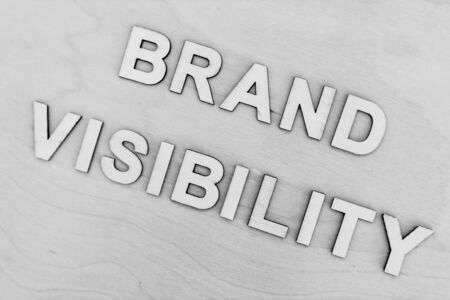 elemtns to build a successful business conceptual still-life, Brand Visibility message on desk with monotone editingの写真素材