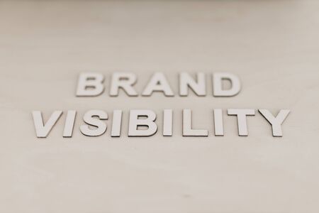 elemtns to build a successful business conceptual still-life, Brand Visibility message on desk with...