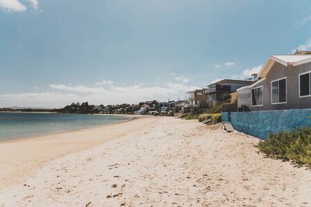 OPOSSUM BAY, TASMANIA - 16th February, 2020: view of Opossum Bay Beach on a sunny summer day with nobody on the beach with deep blue water and clear skies enhancing the beautiful coastline and shoresのeditorial素材