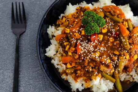 healthy plant-based food recipes, vegan mexican style rice with spicy beans and mixed veggiesの写真素材