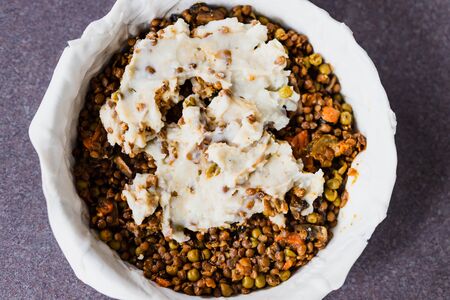 healthy plant-based food recipes, vegan shepherd's pie with lentils and mash potatoes in the makingの写真素材