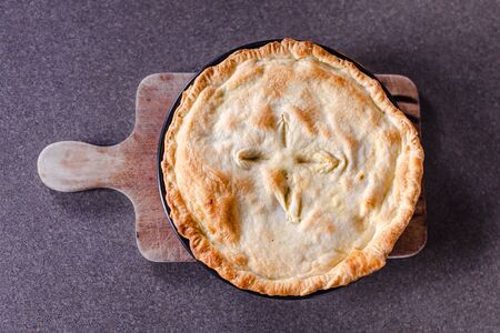 healthy plant-based food recipes, vegan shepherd's pie with lentils and mash potatoes out of the ovenの写真素材