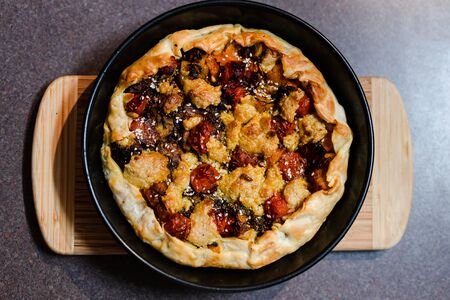 healthy plant-based food recipes, vegan pie with pumpkin zucchini and roasted cherry tomatoes and...