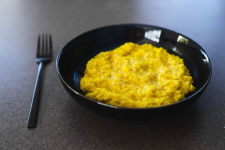 healthy plant-based food recipes concept, vegan turmeric nutritional yeast risotto の写真素材