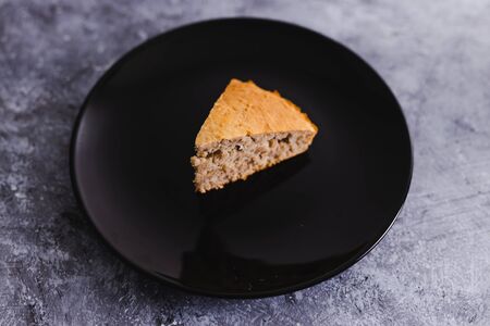 healthy plant-based food recipes concept, slice of vegan banana bread with flax seeds cinnamon and maple syrupの写真素材