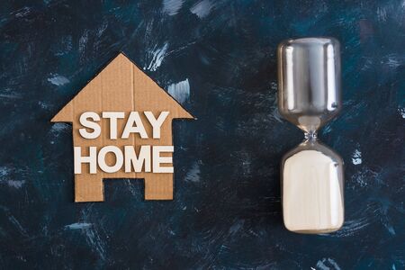 social distancing to flatten the curve against covid-19 virus, Stay Home message with house icon...