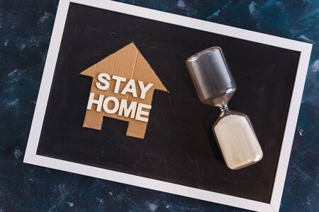 social distancing to flatten the curve against covid-19 virus, Stay Home message with house icon...