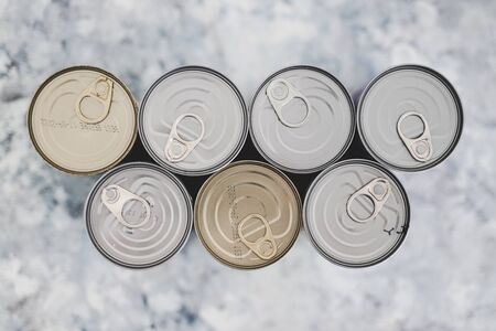 non-perishable pantry food, group of bean cans shot from top down persective at shallow depth of fieldの写真素材